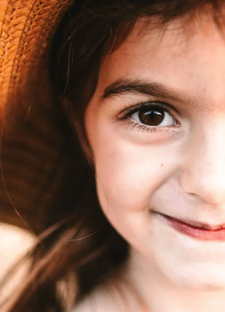 Extreme close-up portrait of a young girl's face and eye, Oxford family photographer