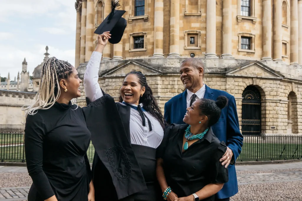 Family celebrating with a graduate outside the Radcliffe Camera in Oxford